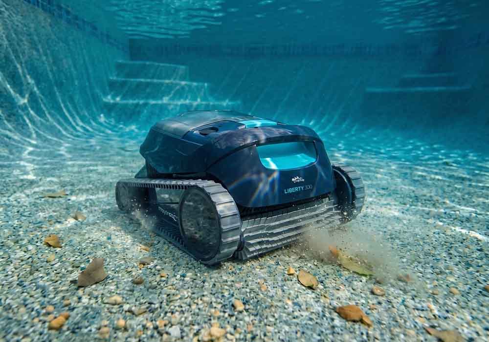Dolphin Liberty 300 cleaning a pebble pool floor with no cable