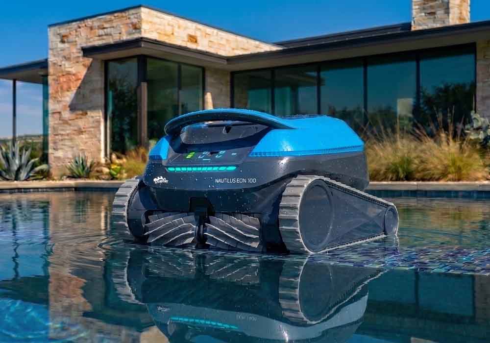 Dolphin Nautilus EON 100 surfacing at the edge of a backyard pool